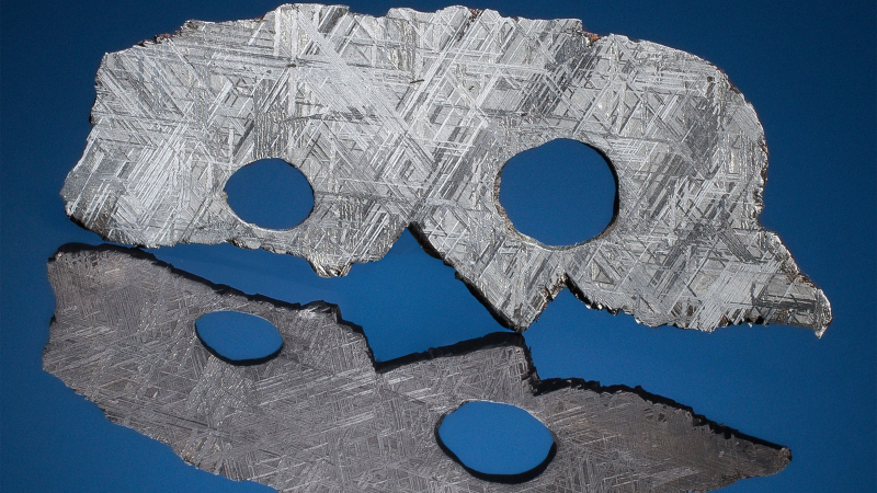 Illustration for article titled 30 Starry Wonders Hiding Inside of Dull Meteorites
